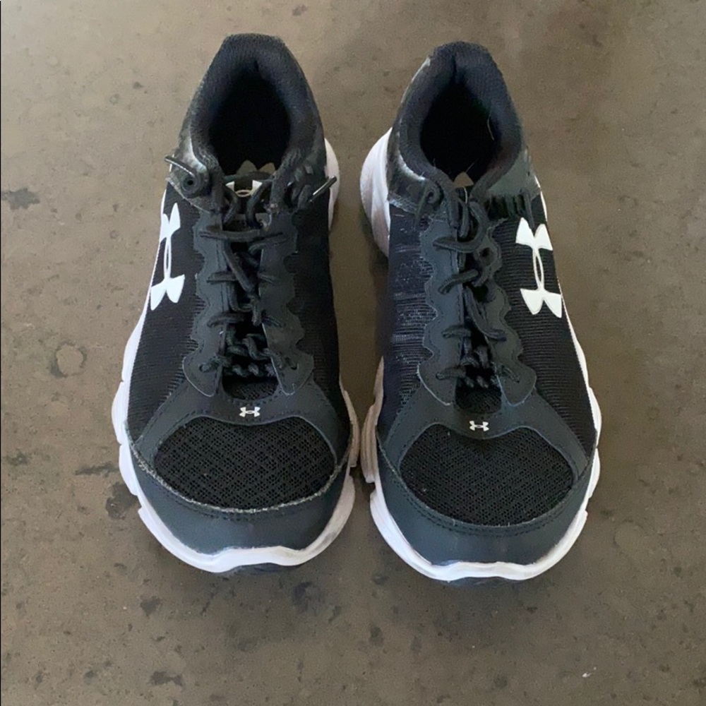 Black Under Armour youth sneakers.